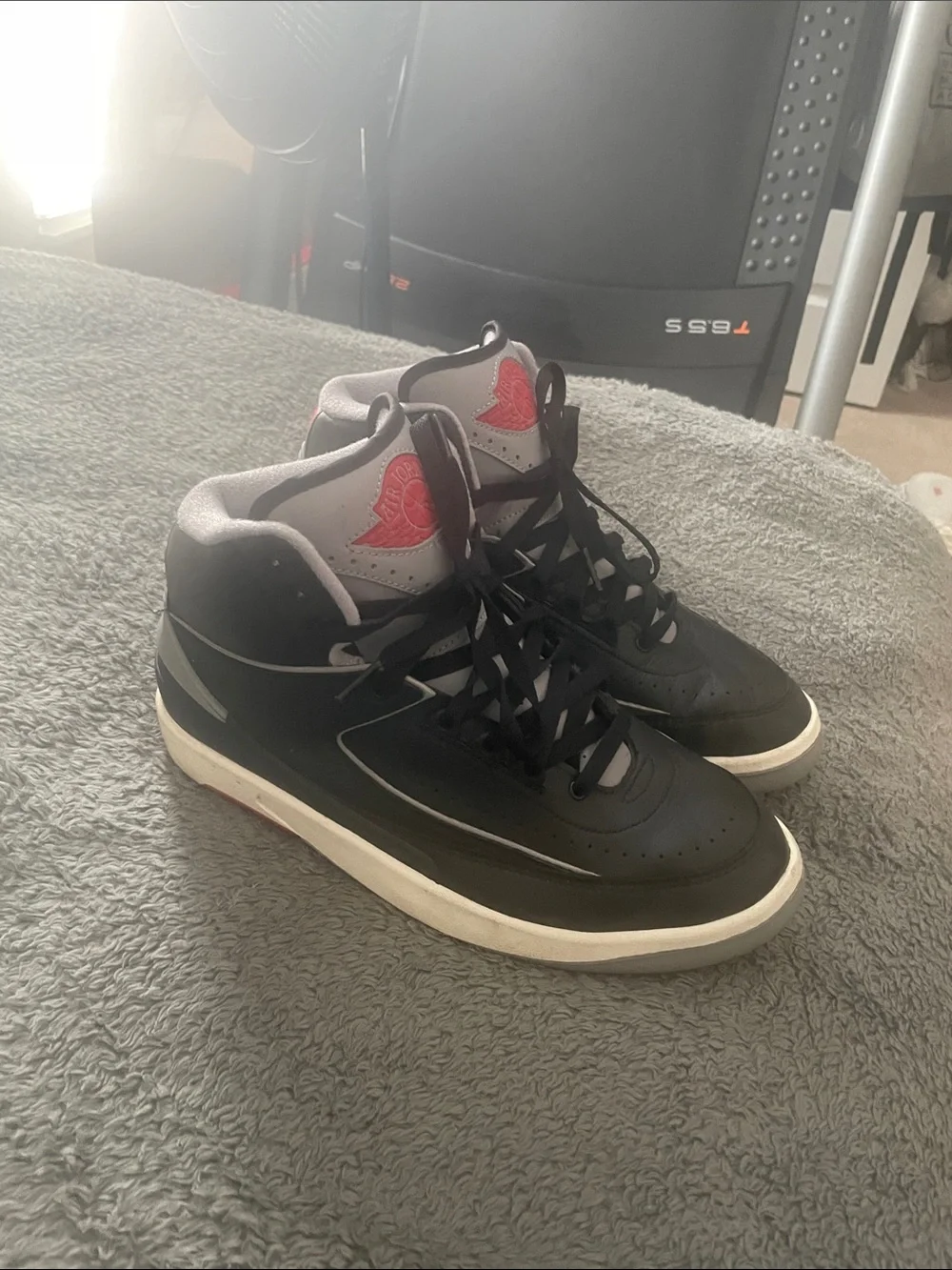 Jordan Men's Black and Gray High-Top Sneakers with Red Accent